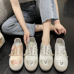 女性のためのスリッポン白い靴卸売夏の新しい弓ニッチデザインレトロスタイル多用途フラットシューズ
