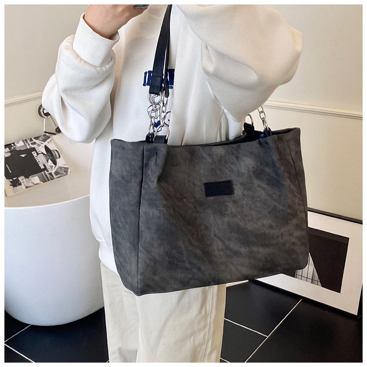 Korean style simple and versatile bag for women, new summer 2025 fashion and niche handbag, large capacity tote bag for commuting undefined