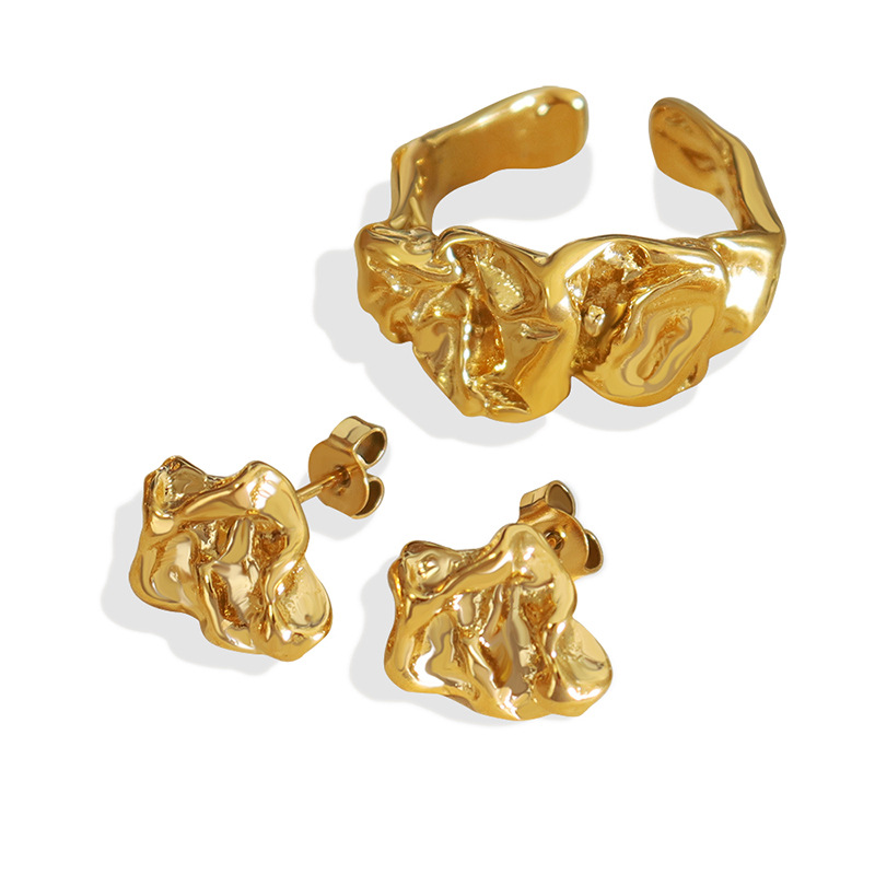 Temperamento retro de las mujeres estilo coreano personalizado diseño de nicho en relieve elegante anillo cóncavo-convexo pendientes traje de joyería