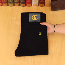 香港潮牌黑色牛仔裤男士秋冬新款修身小脚弹力轻奢加绒休闲裤