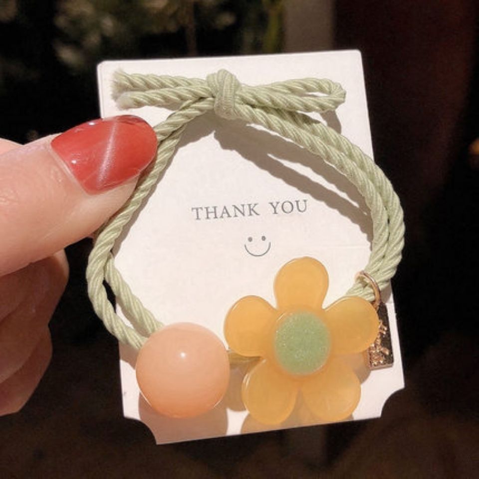 Japonés y coreano Super Hada red cabeza roja cuerda flor redonda banda de goma simple todo-fósforo de la moda de alta apariencia linda chica horquilla