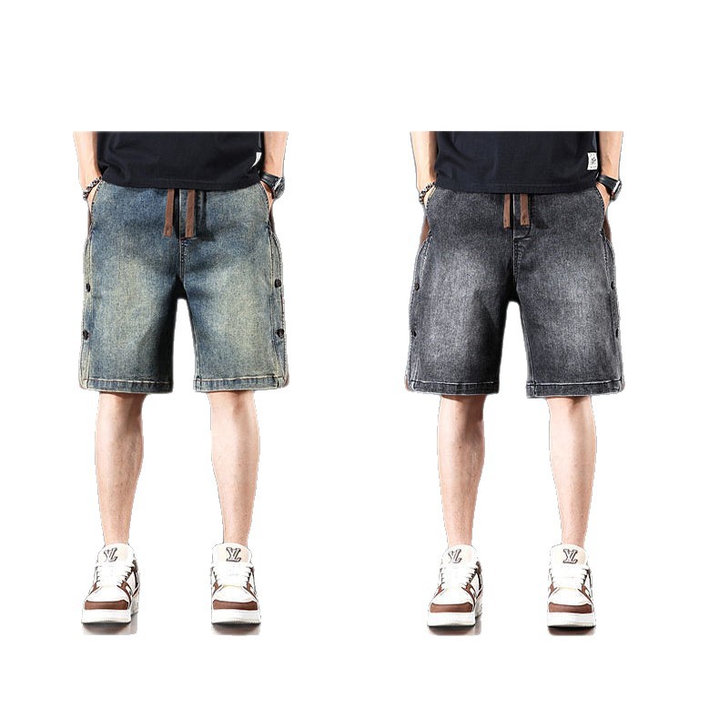 Europa y América pantalones cortos de color mezclado de jeans para hombres de verano nuevo botón empalmado cintura elástica cinco pantalones delgados medio caballo
