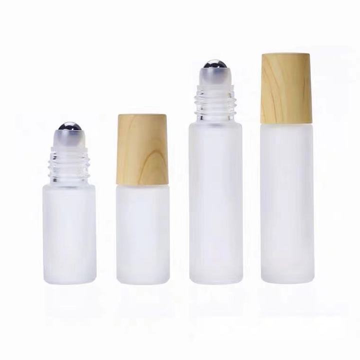 Cubierta de grano de madera botella de rodillo botella de aceite esencial de vidrio esmerilado 5ml10ml cosmético sub-embalaje botella de cuentas pequeña botella de muestra al por mayor