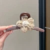 Big khaki crab pin, flowered