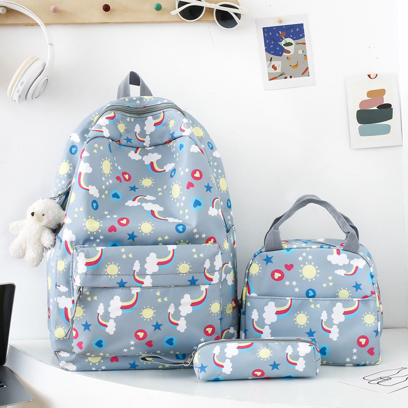 Conjunto de tres piezas de comercio exterior de mochila para estudiantes, mochila informal simple de estilo coreano, bolso para estudiantes de primaria y secundaria de gran capacidad