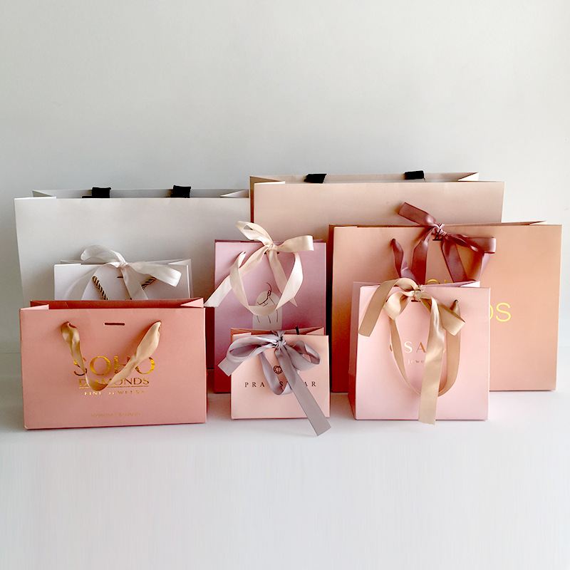 高端做订礼品袋服装店袋子加印logo白卡手提袋外贸出口品质手提袋