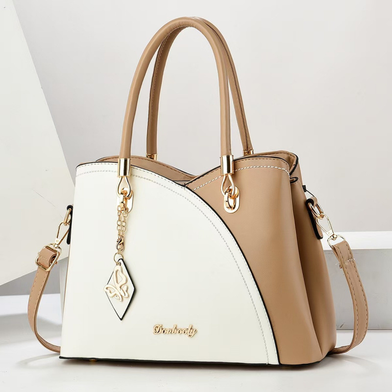 Comercio exterior transfronterizo Taizhou bolsos de mujer texturas colgantes bolsos de hombro mochilas atmósfera bolsos de mujer bolsos de empalme bolsos