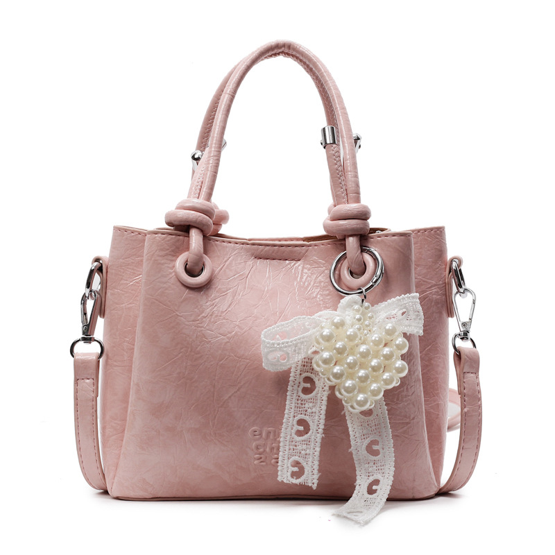 Bolso de mano de tendencia de comercio exterior femenino 2025 nuevo estilo plisado todo-fósforo bolso de hombro retro de alta gama ocio cubo bolso