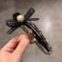 镶钻黑色盘发夹