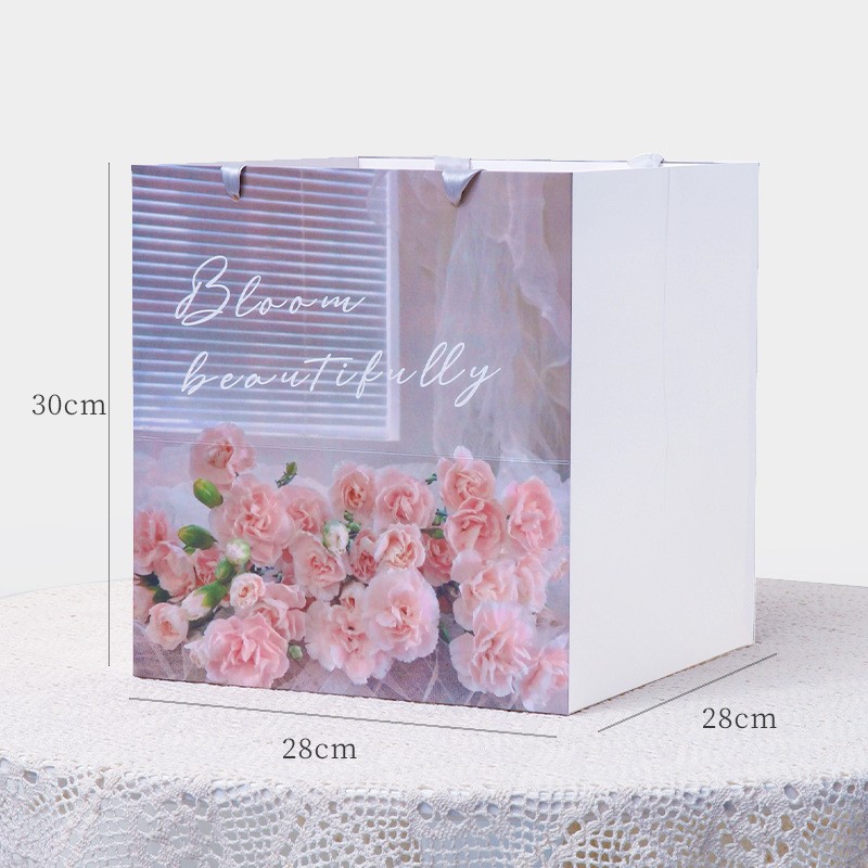Temporada de graduación flor gran letra bolsa de regalo al por mayor tarjeta de papel gruesa regalo cuadrado mano ramo bolso de año nuevo
