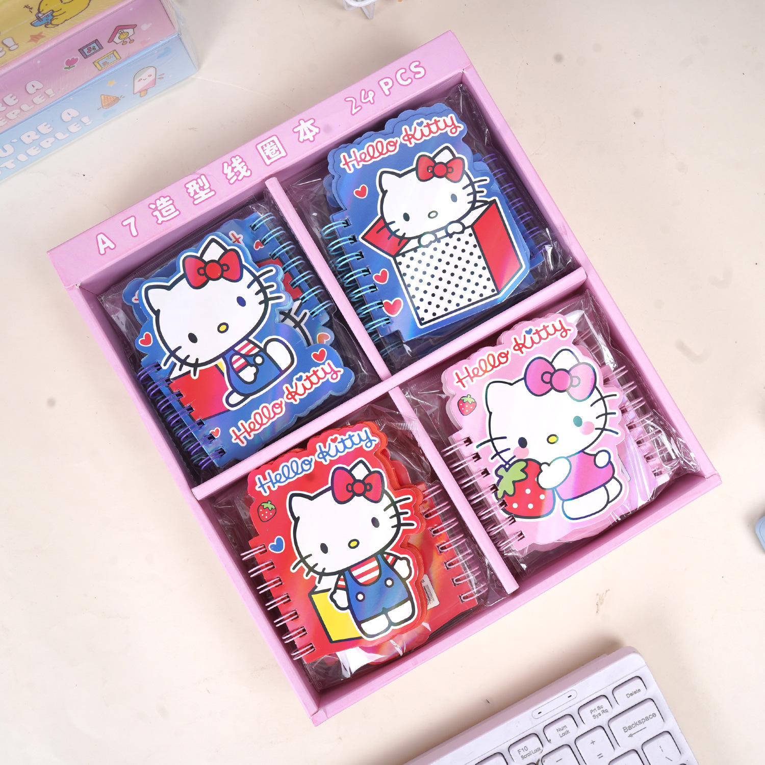 Caricatura Kitty A7 bobina de forma especial esta creativa Sanrio línea horizontal página de color cuaderno de mano fuente de cuaderno de estudiantes
