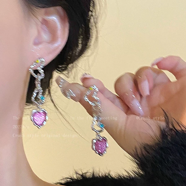 Fuchsia mosquito coil, ear clips