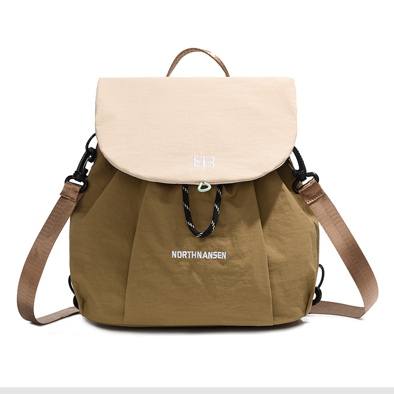 Hombres y mujeres mochila 2025 nueva mochila de estudiantes coreana de gran capacidad, mochila escolar de estilo universitario, mochila de viaje ocio