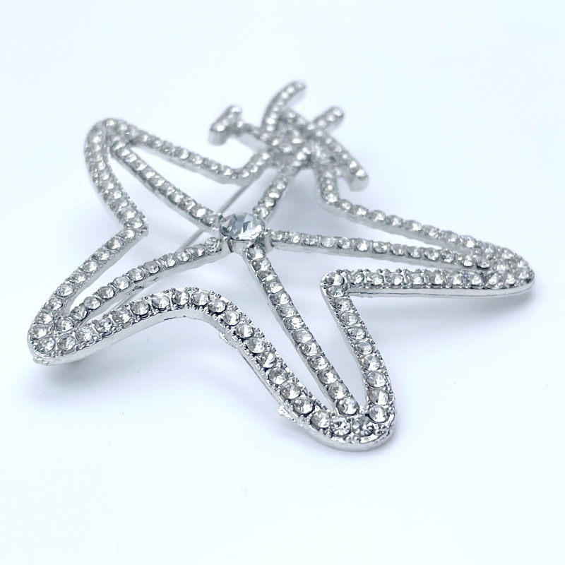 Venta caliente europea y coreana pin luz lujo moda viajero versátil estrella de cinco puntas broche Inglés estilo Chanel ramillete personalizado Accesorios