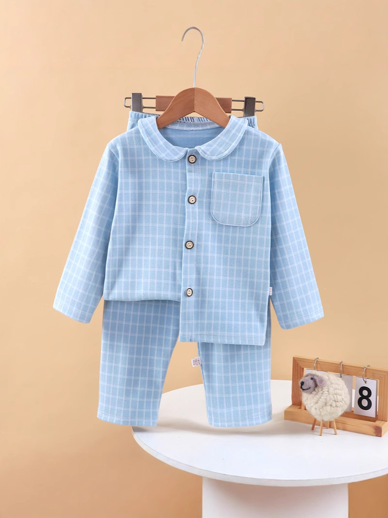 Nuevos productos para niños de otoño y invierno cuadrado de manga larga pijamas sueltos cuadrados de camisa caliente para niños pijamas para el hogar