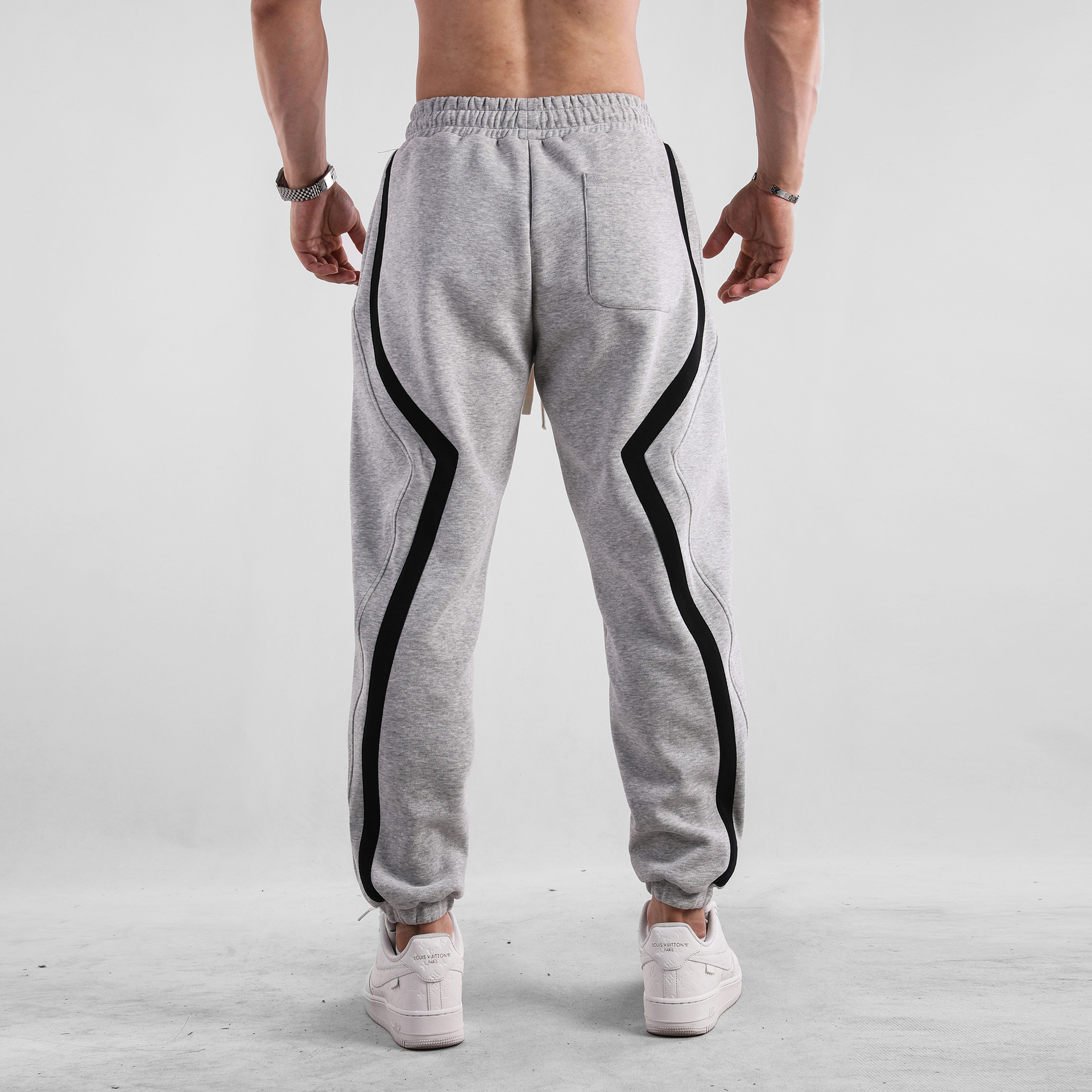 Otoño e Invierno a rayas americano casual deportes europeo y americano más tamaño pantalones sueltos pantalones de chándal muscle hombres deportes nueva moda