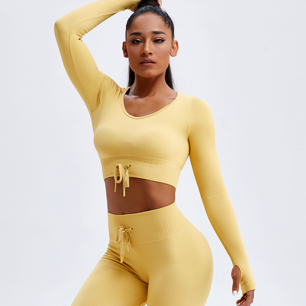 Hilo transfronterizo con cordones ropa de yoga ajustada para mujeres otoño e invierno nuevo gimnasio de secado rápido expuesto ombligo deportes Top manga larga