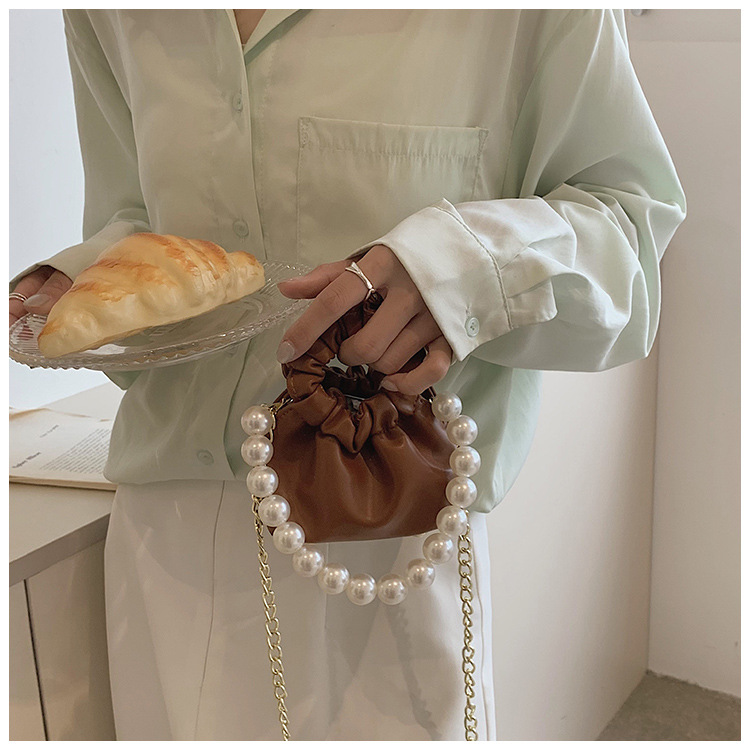 255g Weight Beading, Pearls Fashion Element Clasp Frame Closure Type Top Handle, Chain Strap Type Crossbody Bag Bags Type Casual, Daily, Shopping Occasion Pu Leather Material Solid Color Pattern All Seasons Season Kid'S Gender Cute Style Bucket Shape Kid'S Pu Leather Solid Color Cute Beading Pearls Bucket Clasp Frame Crossbody Bag 34