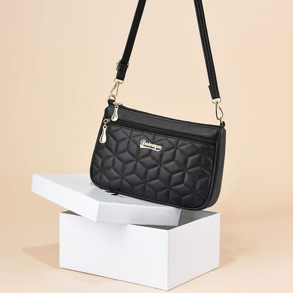 Capacious shoulder bag