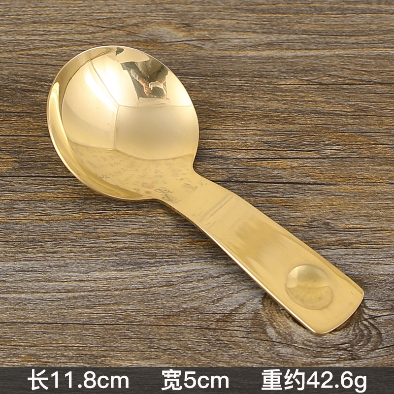구덩이 손잡이가있는 큰 둥근 머리 숟가락