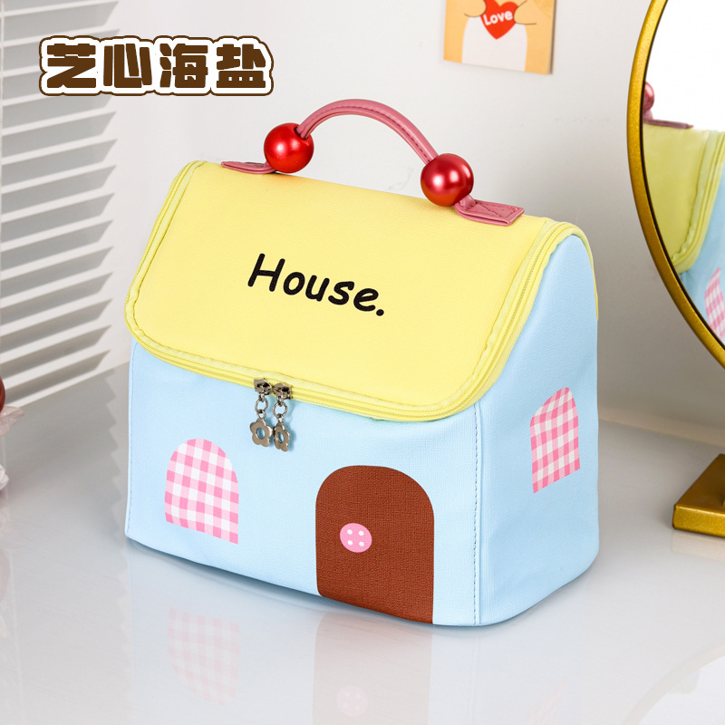 Bolsa de cosméticos de alto valor estilo caliente linda bolsa de lavado de casa pequeña bolsa de almacenamiento de cosméticos bolsa de viaje impermeable de gran capacidad