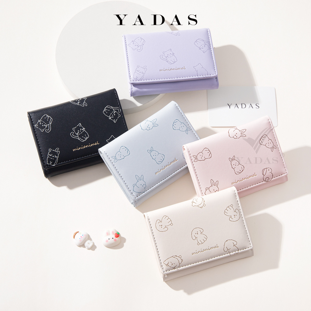 Monedero japonés simple para mujeres corto delgado y compacto cartera de estudiantes plegables nueva cartera de nicho encantadora