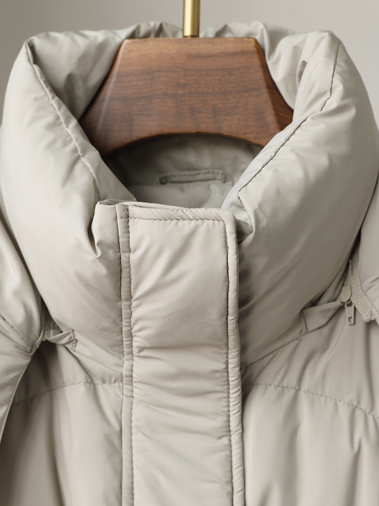 Gran venta, chaqueta de plumón para mujer, nueva chaqueta de otoño e invierno 2025, chaqueta holgada de plumón de pato blanco Pinghu con cuello levantado largo
