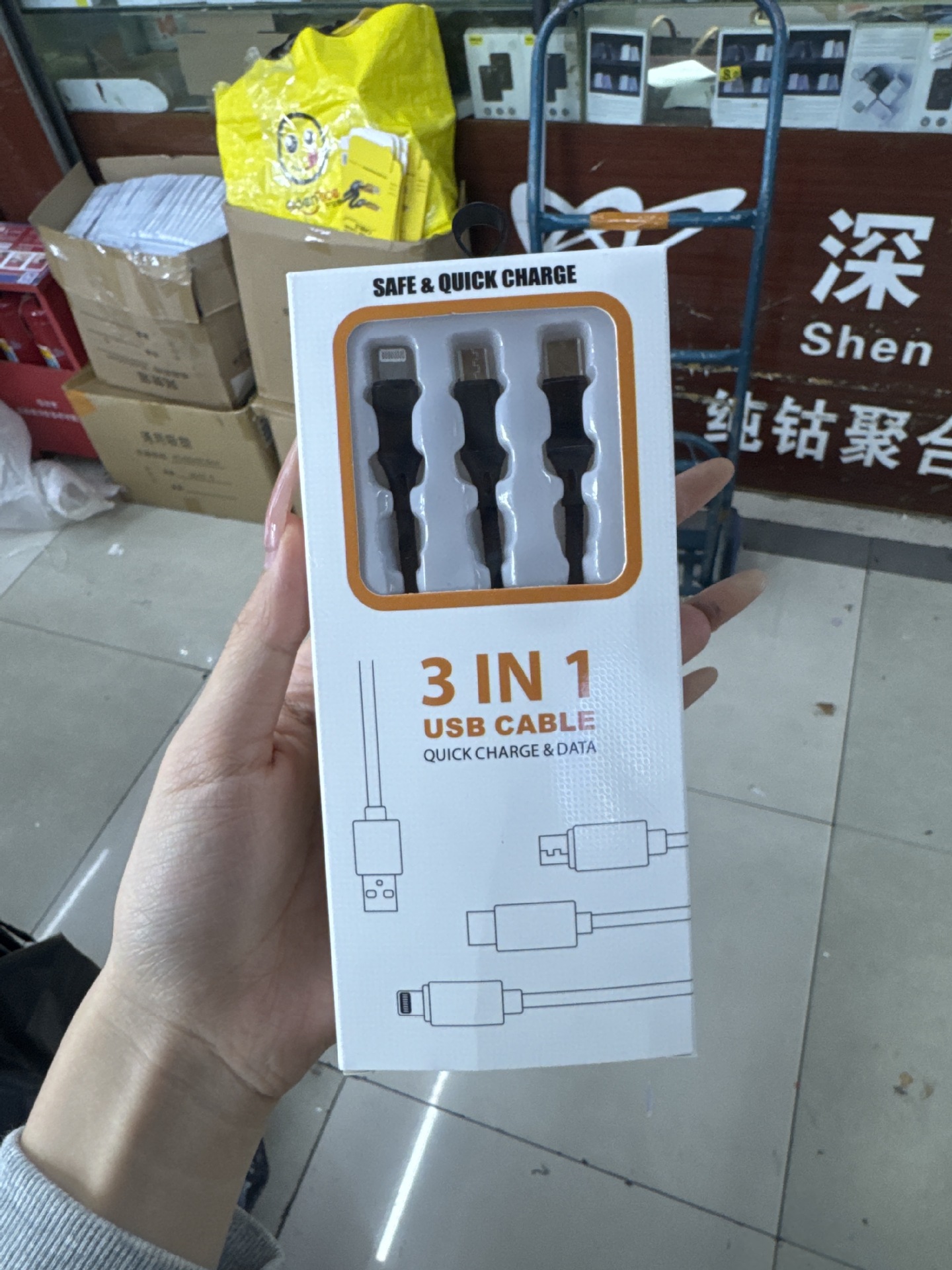 Cable de carga de teléfono móvil tres en uno tejido de nailon de fábrica para el cable de datos uno a tres de Apple tipo Android