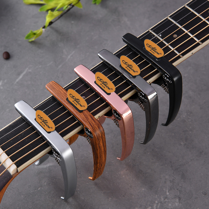 Folk acoustic guitar capo three-in-one multifunctional metal capo ukulele universal capo wholesale