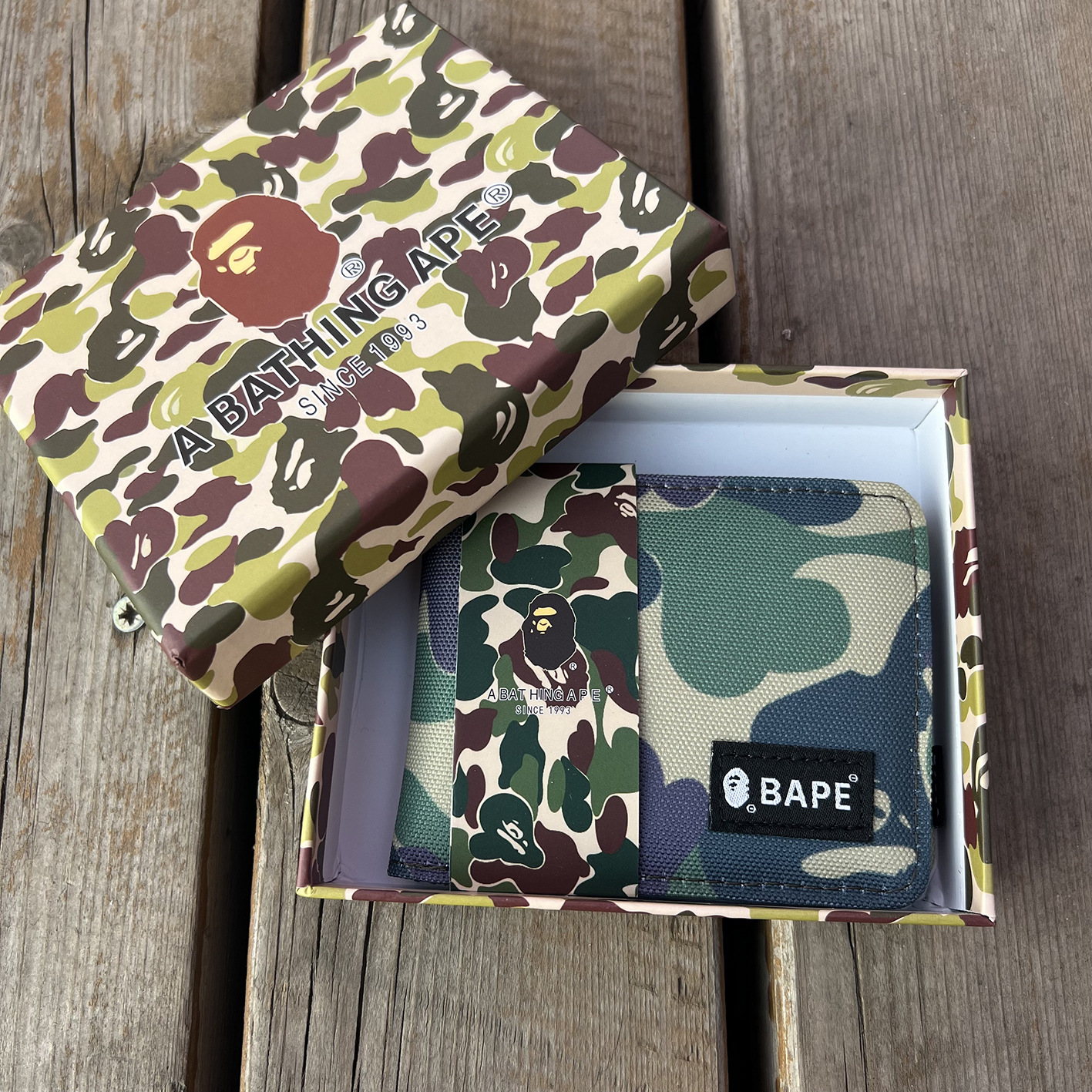 Short human head, camouflage box