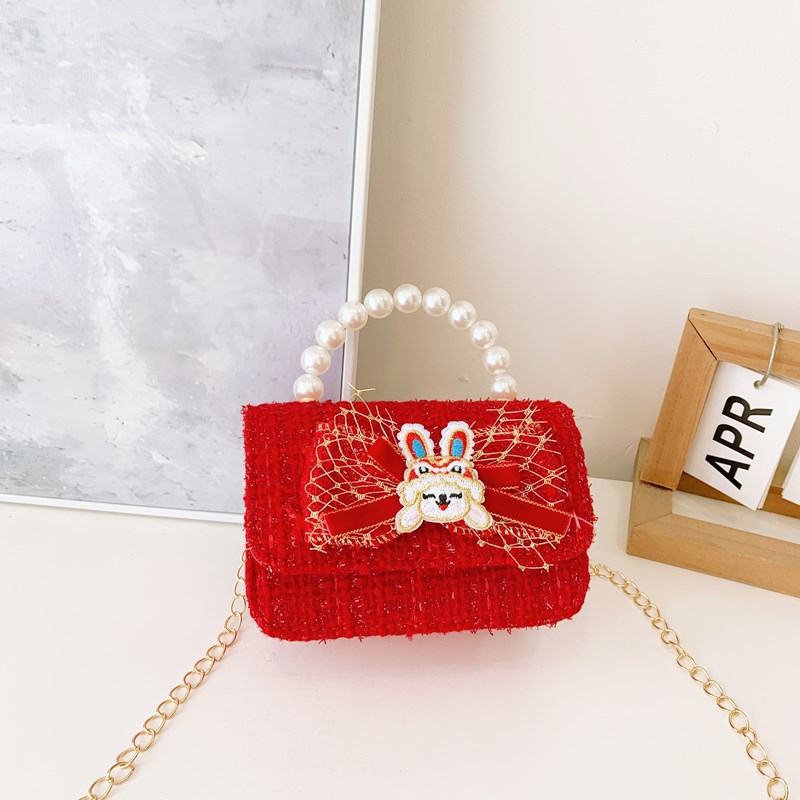 Pequeño viento rojo perfumado bolsos de Año Nuevo para niños y niñas lindos bolsos de perlas de arco 2025 nuevos bolsos de cadenas para niños