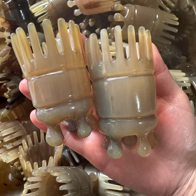 牛の角のクラウンの金の頭はマッサージして牛の角の頭を洗って両面の歯を洗って牛の角の頭のツボの櫛を洗います。|undefined