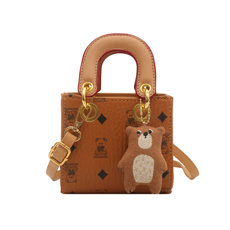 2026 nuevo bolso infantil caricatura lindo oso impresión bolso de hombro de moda mini bolso de bebé