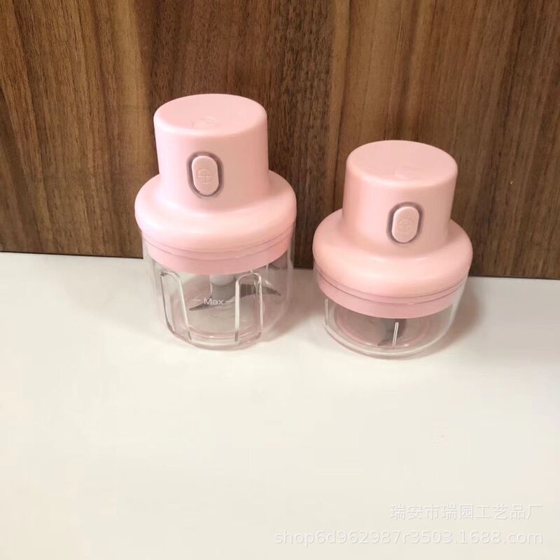 電気のニンニクの泥の器はニンニクの蓉の器のミニのニンニクの泥の器を打ってニンニクの器をつぶします。|undefined