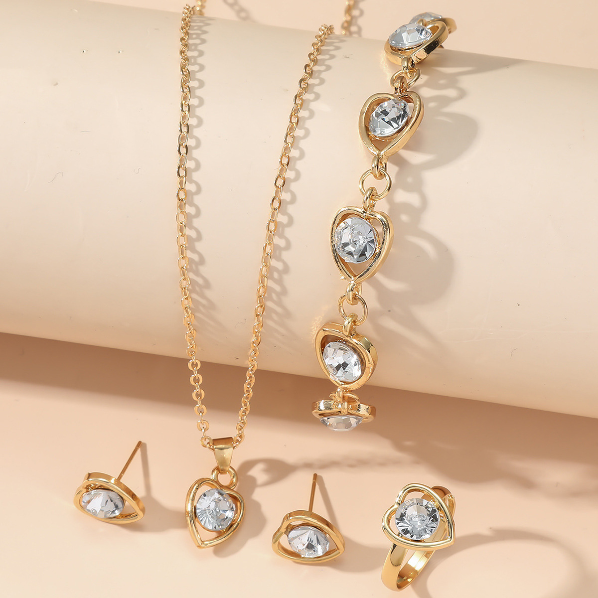 Amazon transfronterizo Europa y Estados Unidos amor de cristal joyas de moda temperamento corazón de melocotón collar pendientes anillo pulsera conjunto de cuatro piezas