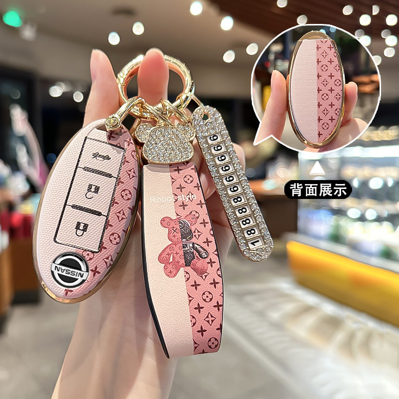 Suitable for Nissan Qashqai Key Cover Tiida Ariya Aria Murano High-End Shell Sylphy 14Th Generation All-Inclusive Female Buckle