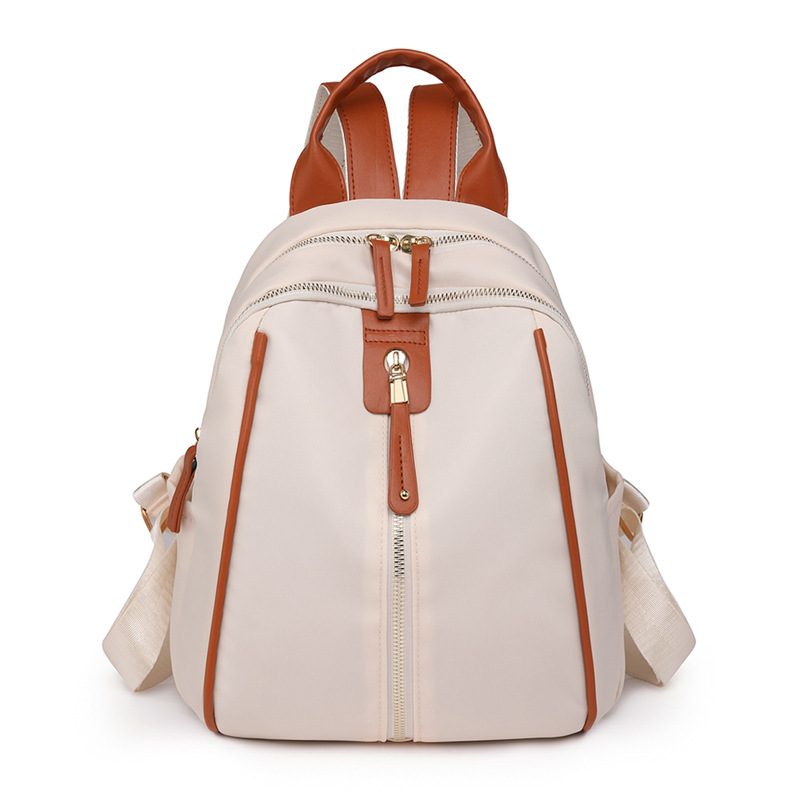 Mochila de nailon para mujer 2024 nueva moda anti-salpicaduras para mujer mochila de concha estilo occidental bolso de viaje de ocio