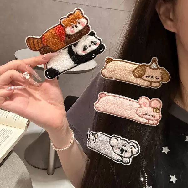 Cute cartoon animal hair clips with Velcro backing, perfect for girls to easily manage stray hairs without leaving marks