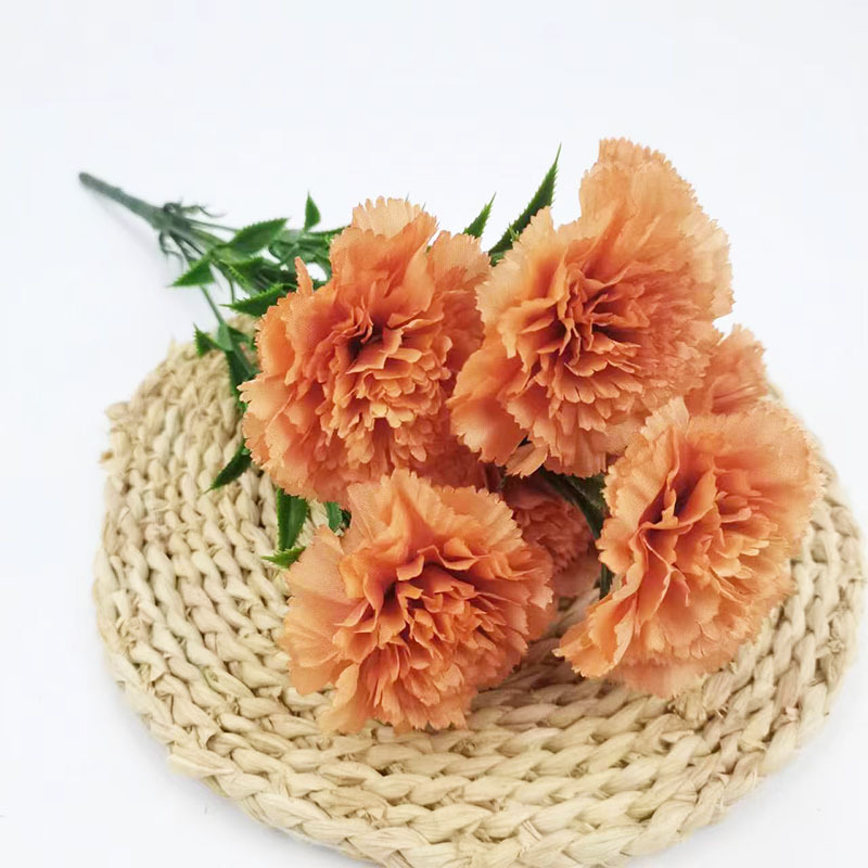 Xiaoyu Simulation Flower 7 Claveles Manlos de estilo europeo Ramo de claveles del día de la madre Paquete suave interior al por mayor