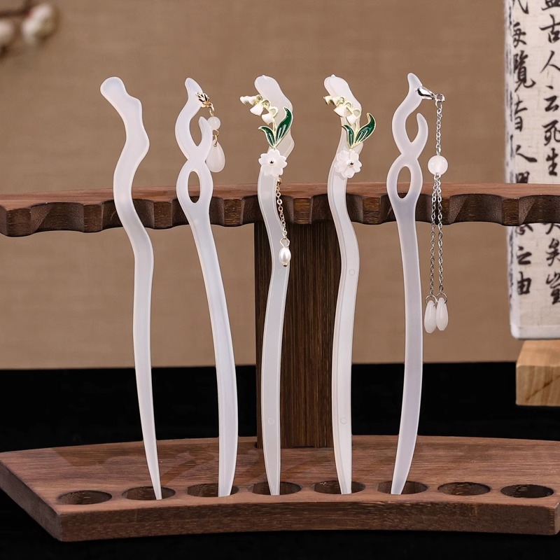 Nueva horquilla china 2025 nuevo estilo estilo antiguo horquilla mujer falda de cara de caballo de alta calidad estilo nacional horquilla de madera paso a paso horquilla tocado