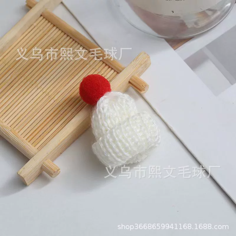 Small hat, scarf, doll, decorations