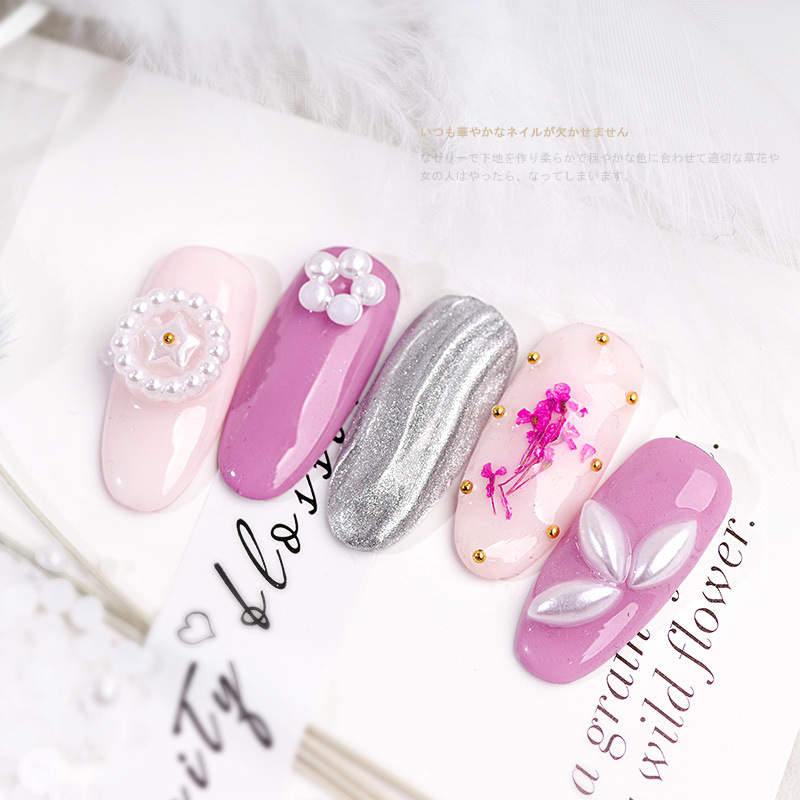 Venta al por mayor blanco beige tamaño semicírculo perla tridimensional paquete DIY hecho a mano uñas joyas de perlas planas