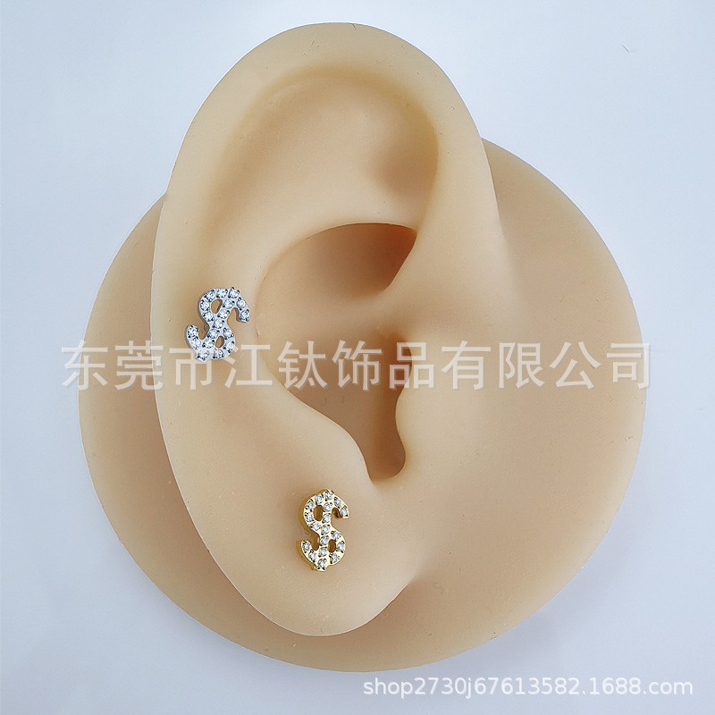 Silver pointed spike labret stud material detail