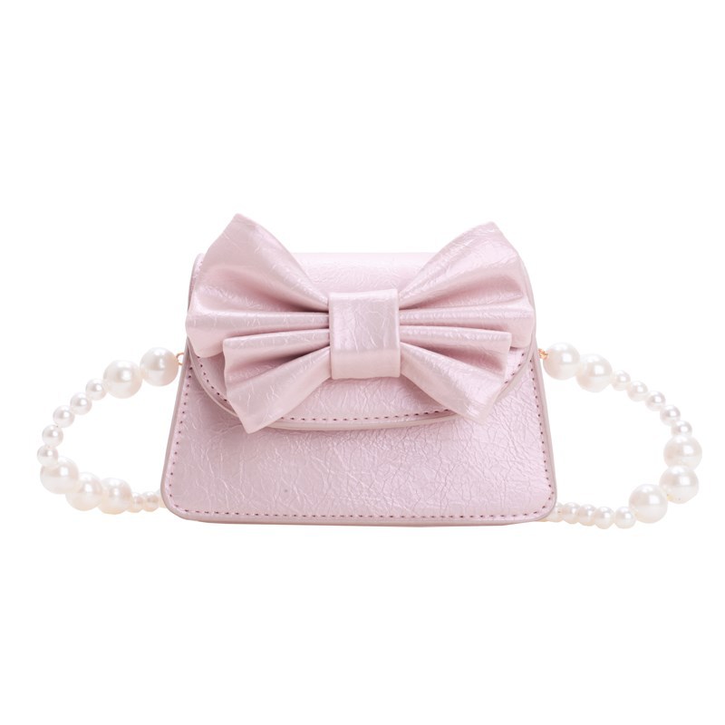 Coreano estilo extranjero mini niñas bolso de hombro lindo arco bebé mochila nueva moda bolso de cadena para niños