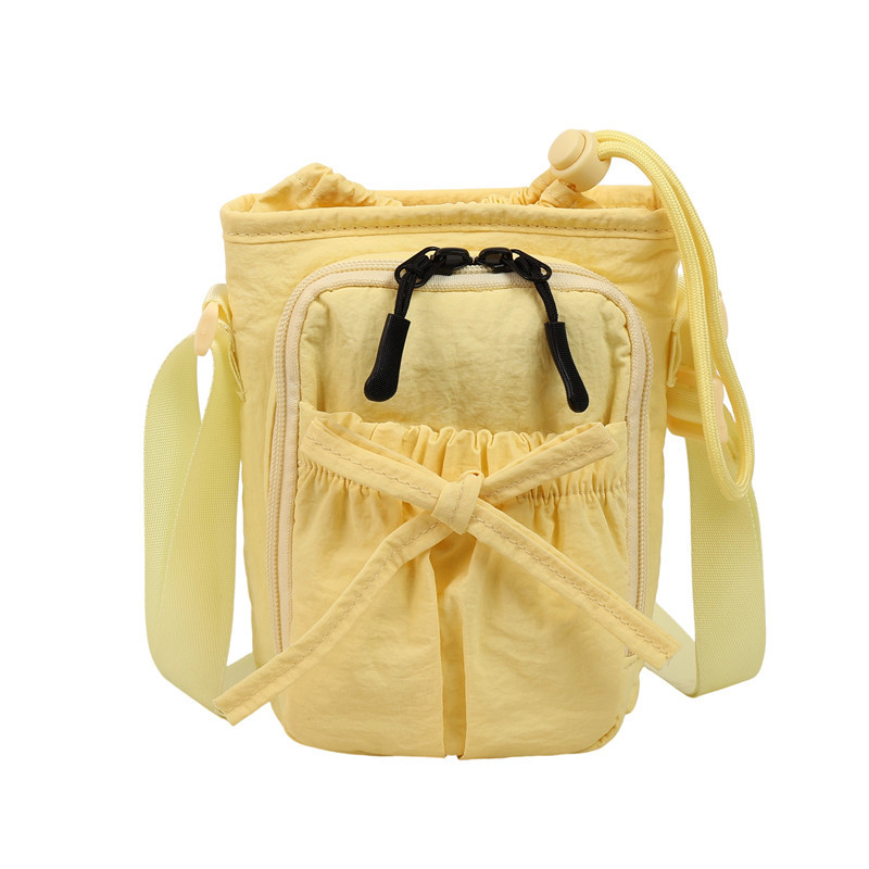 Bolso de teléfono móvil de moda coreana 2025 verano nuevo bolso femenino lindo lazo bolso de hombro bolso de mensajero de lona casual