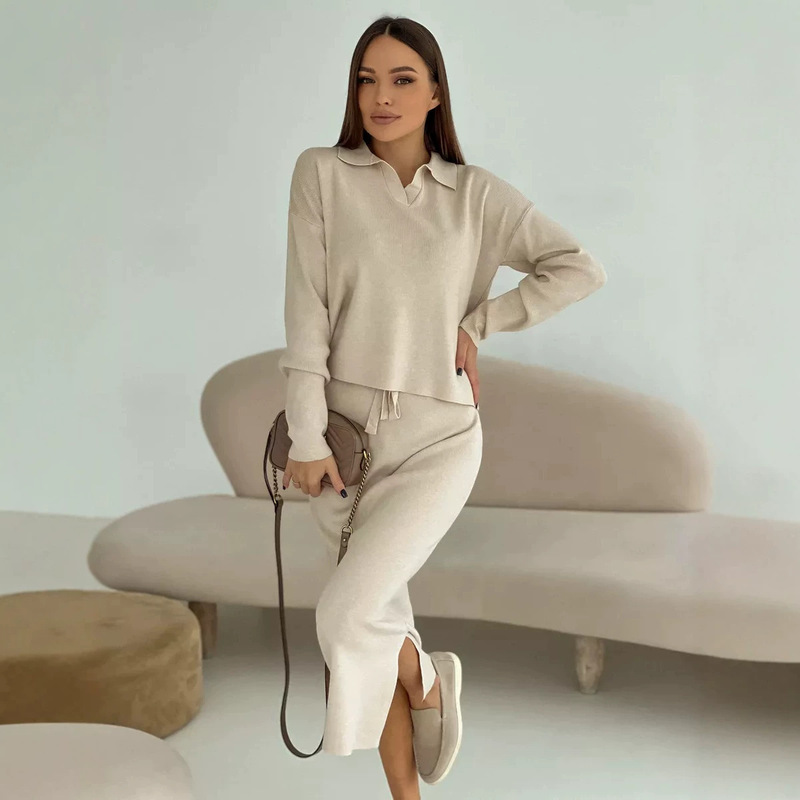 2026 Fall/Winter New European and American Style Knit Set for Women: Soft Core-Spun Yarn Slit Sweater with Tie-Waist Skirt 2026 Fall/Winter New European and American Style Knit Set for Women: Soft Core-Spun Yarn Slit Sweater with Tie-Waist Skirt
