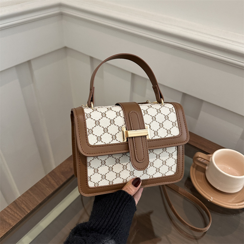 2025 nueva moda simple de alto valor de cara bolso de hombro de moda retrógrada impresión de personalidad bolso de viaje portátil pequeño