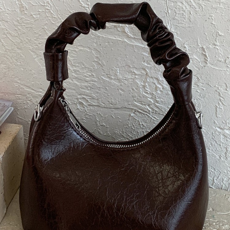 2026 primavera nueva moda temperamento bolso de hombro de moda bolso de arco de moda moda bolso de mano de tendencia diaria plegado mochila