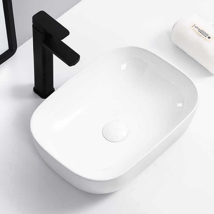 Fábrica directa de nuevo lavabo de cerámica balcón doméstico lavabo de baño de apartamento de hotel lavabo