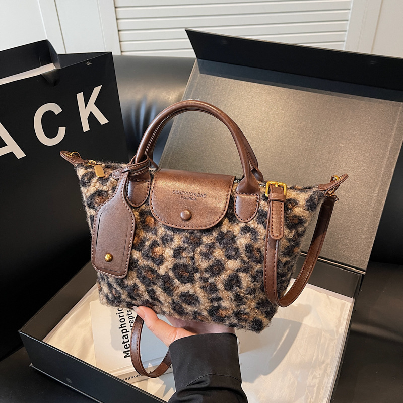 Bolso de mano con estampado de leopardo de moda retro de comercio exterior para mujer otoño e invierno nuevo diseño de nicho bolso de mensajero de gran capacidad bolso de hombro
